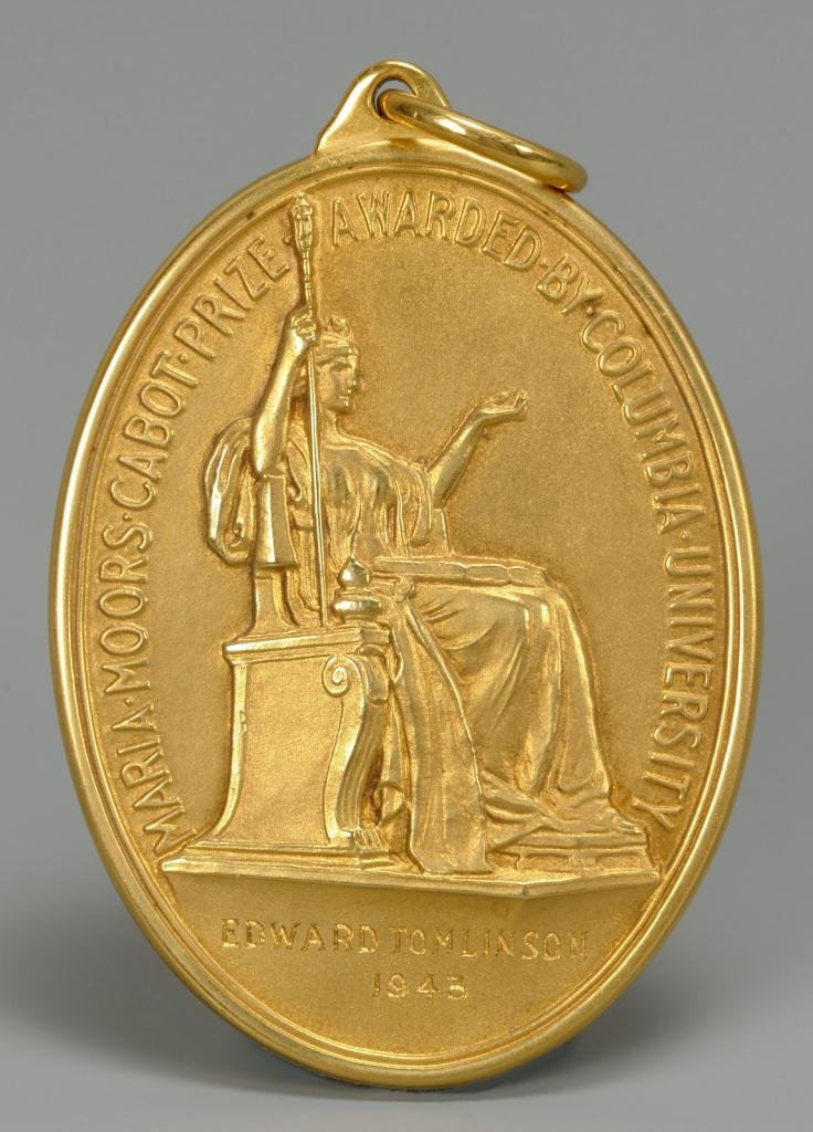 Tiffany 18KT Columbia University Prize Medal: Tiffany & Co. 18KT Maria Moors Cabot Prize Medal awarded by Columbia University to Edward Tomlinson, 1943. Oval with a beveled edge and polished finish. Marked on bottom of outer ring " Tiffany & Co. 