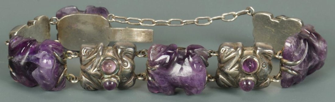 Spratling Silver and Amethyst Frog Bracelet: A William Spratling (1900-1967) silver and amethyst quartz bracelet with alternating figural frog designs, box clasp and safety chain, signed with WS circle mark: Spratling Silver Made in Mexico (circ