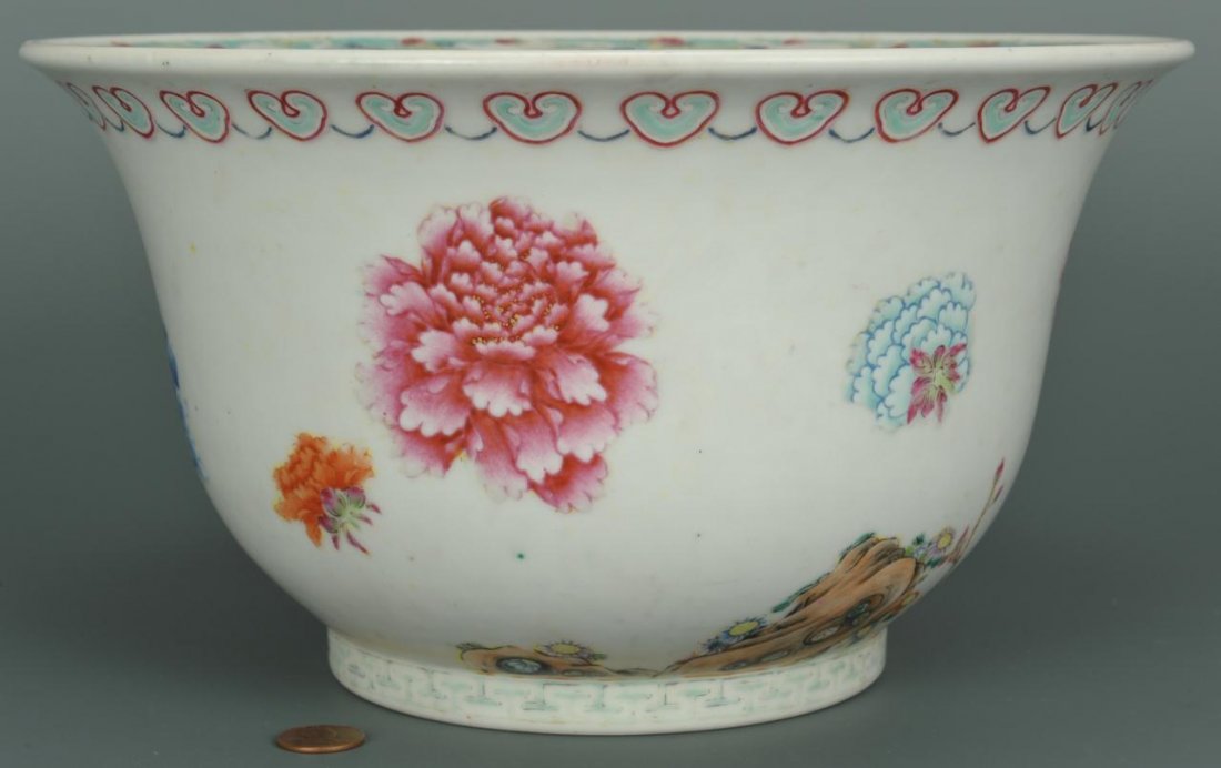 Chinese Porcelain Jardiniere: Chinese porcelain Jardiniere, possibly early Republic period, with well painted motifs of peonies, prunus, rocks and fungus and a fretwork design on foot ring. "Ghost" images of bats on upper rim. Red