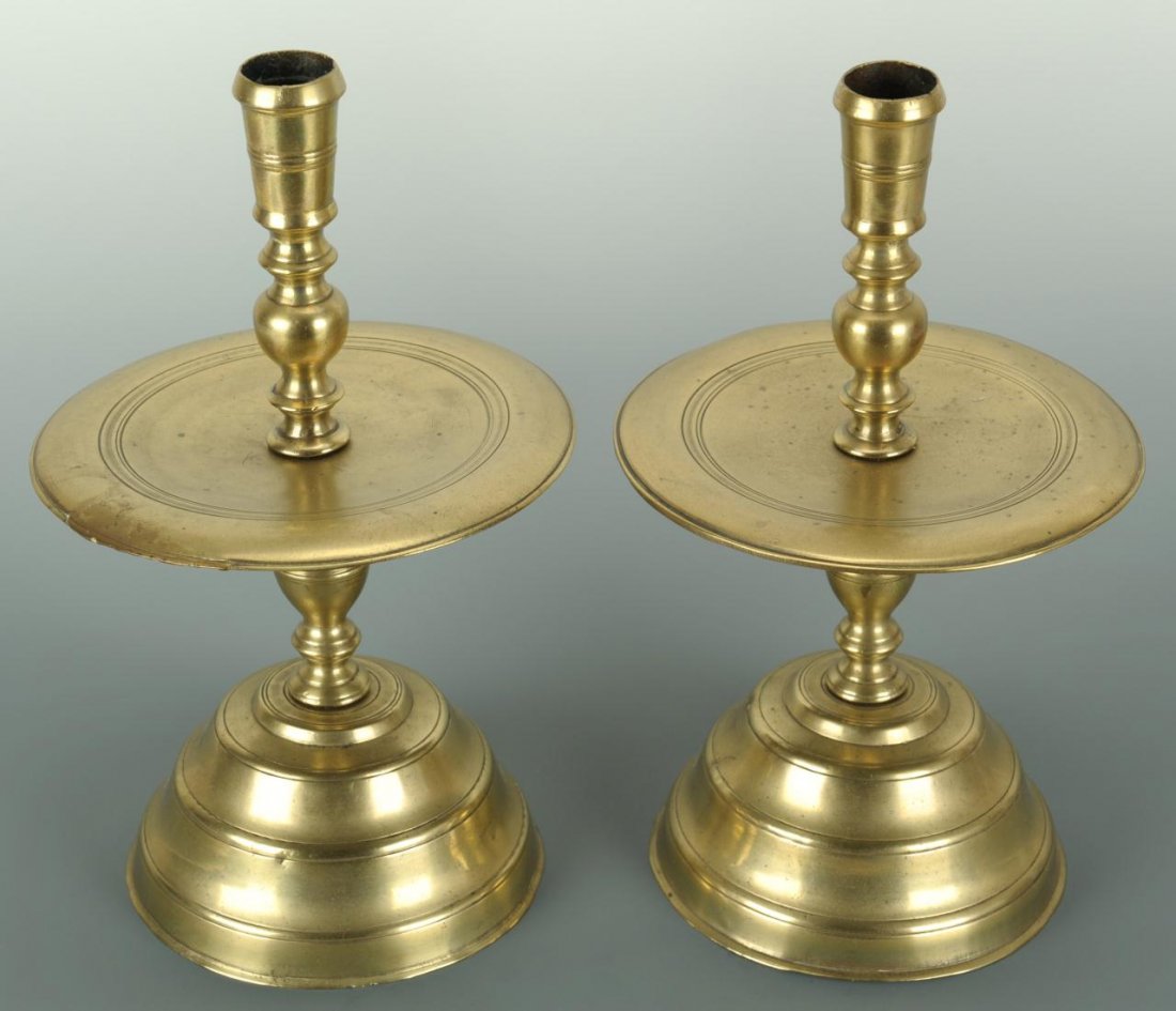 Pair of 18th c. Dutch Brass Candlesticks: Pair of 18th century Dutch brass candlesticks with mid drip and stepped circular bases. 10 3/4" H.