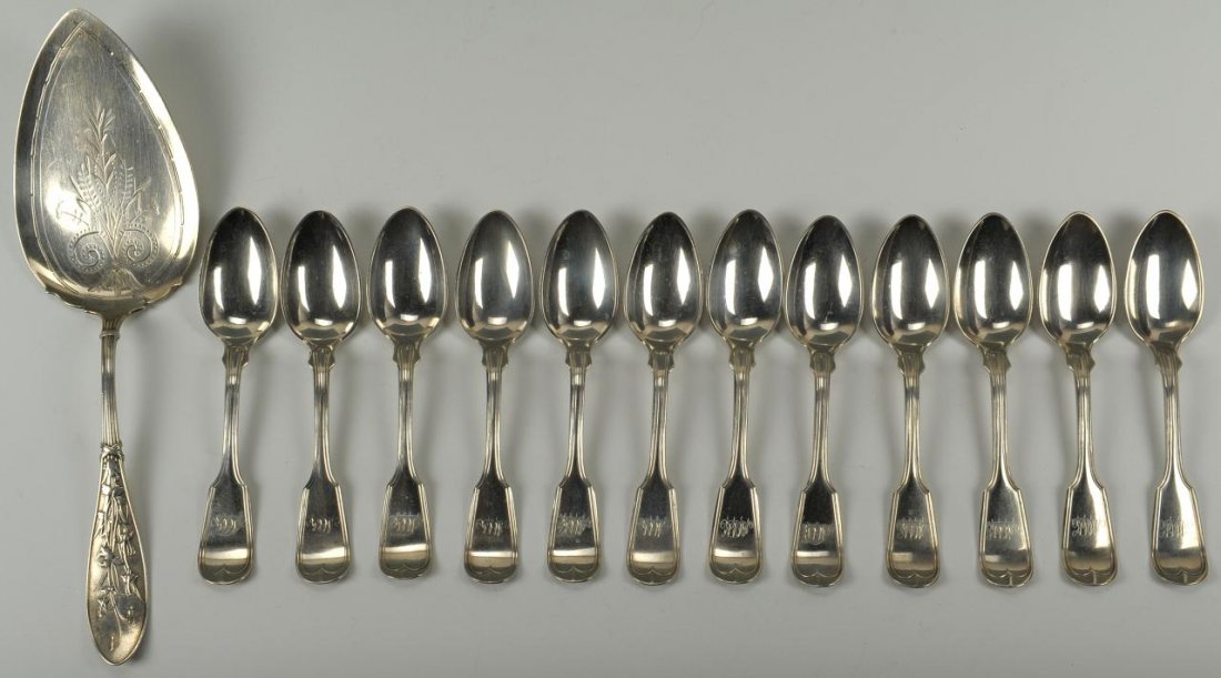 12 Caldwell sterling spoons & Whiting sterling Pie: 1st item - Boxed set of twelve sterling silver teaspoons with oval Fiddle Thread handles, each monogammed AMK and marked on back J.E. Caldwell & Co. Sterling (Philadelphia, circa 1860). Each 5-3/4", 1