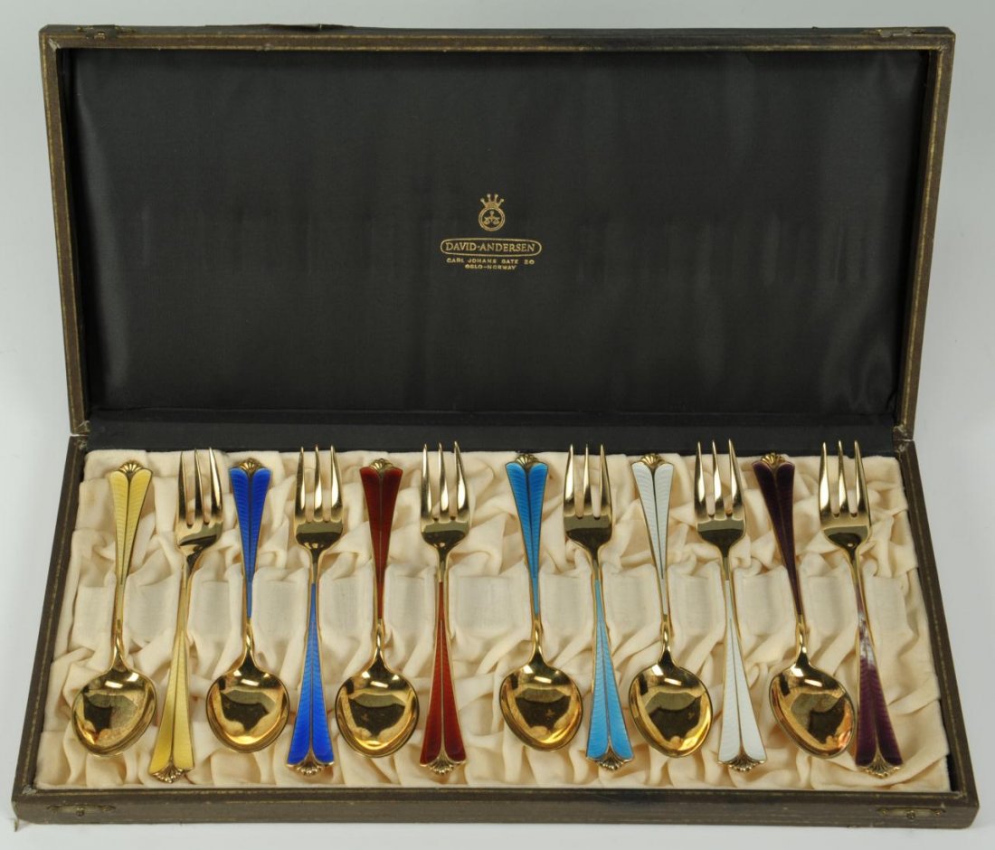 12 pcs David Andersen Enameled Silver flatware: 12 pieces of enameled silver-gilt flatware, all stamped David Andersen Norway Sterling with hallmarks, 6 teaspoons and six dessert forks, all approximately 5-3/4"L. Encased in a silk and velvet lined