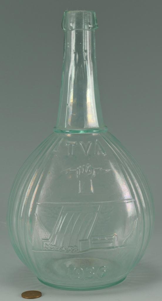 1936 Franklin Roosevelt TVA Glass Bottle: 1936 Franklin Roosevelt TVA (Tennesee Valley Authority) glass bottle, possibly made for dedication of the Norris Dam located in Norris, Tennessee. Raised image of Franklin Delano Roosevelt above the A