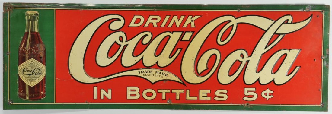 Circa 1915 Coca-Cola Embossed Sign: Circa 1915 Coca-Cola embossed sign "Drink Coca-Cola in Bottles 5 cents," with image of early bottle on left. 11 3/4" H x 35 1/2" W. Provenance: Consignor removed this sign in 1969 from a coal shute in