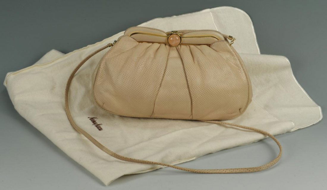 Judith Leiber Snakeskin Evening Bag: A Judith Leiber beige snakeskin evening bag or purse, in a round shape with gold tone hardware and a pink cabochon closure and removable strap. Stamped on the interior, " Judith Leiber, 1986, Made in