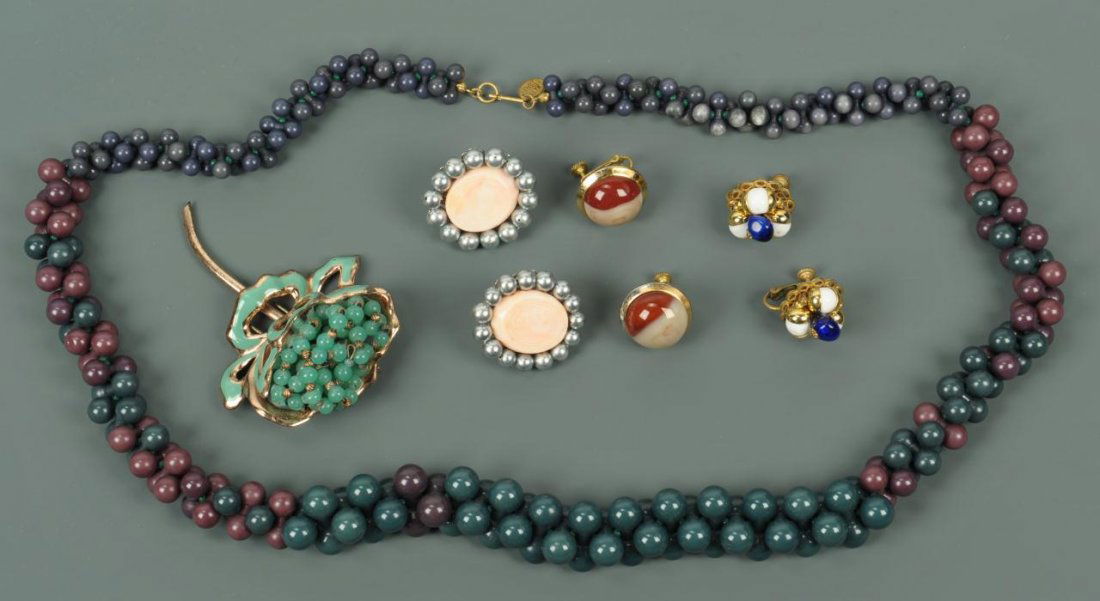 Costume jewelry lot: M. Haskell & N. Rosenstein: Group of mid 20th century costume jewelry including a Nettie Rosenstein pin, Miriam Haskell necklace and 3 pairs of Miriam Haskell clip-back earrings, all signed. 1st item: Gilded and enameled sterlin