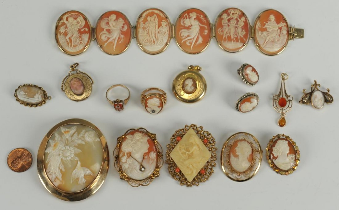 14 items of Cameo Jewelry, some 14K and 10K: (1) Cameo bracelet with shell carved oval Classical style scenes in a gold-filled setting, 1-3/8"H x7-1/2" L. (2) Cameo set in a round engraved gold-plated locket, 1" diameter. (3) Pink cameo in a rou