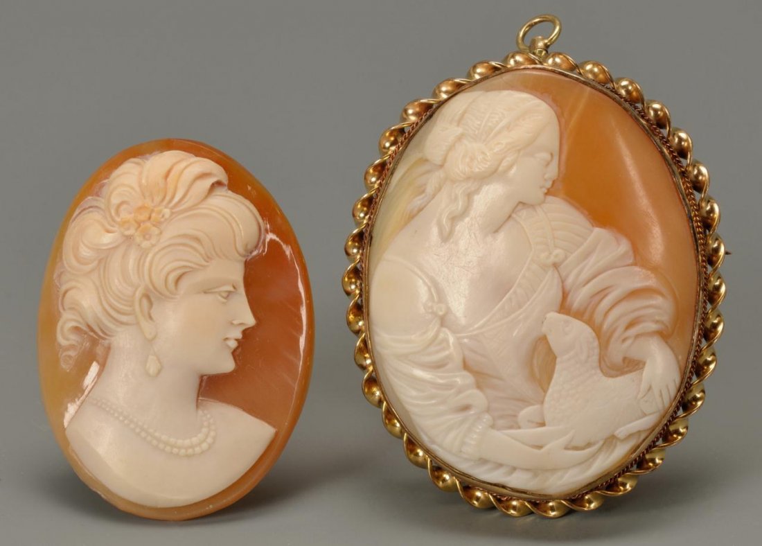 2 Cameos: Lady with Lamb and Edwardian: Two shell carved cameos. (1) Cameo pendant-brooch of Renaissance dressed woman holding a lamb and bezel set in a 10K yellow gold twist gold frame with pin stem and catch and swivel up bail, 2" H x 1-5