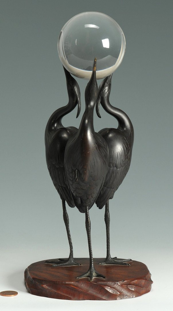 Signed Japanese Art Deco Bronze Okimono of 3 Cranes: Signed Japanese Art Deco period bronze okimono depicting three cranes, each delicately balancing on one leg with upturned beaks balancing a crystal ball. Signed with two signatures, a chiseled signatu