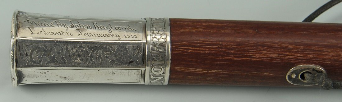 Tennessee Coin Silver handled Walking Stick: Hickory walking stick with coin silver handle, faceted and engraved PRESENTED TO L. SYPERT OF LEBANON TENNESSEE BY W.C. SYPERT OF NACOGDOCHES TEXAS / MADE BY JOHN RAGLAND LEBANON JANUARY 1853, over a 