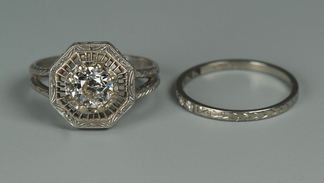 European cut diamond solitaire w/ dia band: Ladies diamond wedding set, octagon top split shank style diamond ring in 14K white gold, containing one bead set old European cut diamond, approximately 0.90 carat, VVS2 clarity, G-H color with an 18