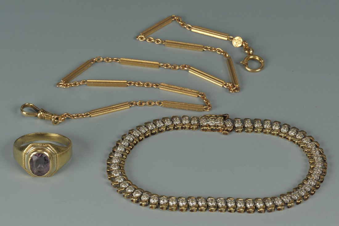 14K ring, 14K watch chain, 10K dia bracelet: 1st item: 14K yellow gold amethyst ring, 6.9 grams, size 7 large. 2nd item: 14K pocketwatch link chain with alternating long bar and small oval links, 9.4 grams, 13-3/4" L. 3rd item: 10K yellow and wh