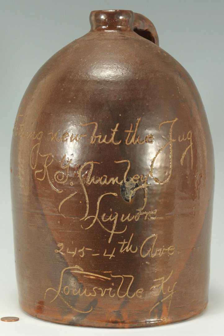 Louisville KY R.Y. Shanley Whiskey Jug: Louisville, Kentucky pottery whiskey jug with script reading "Nothing new but the Jug, R. Y. Shanley Liquors, 245 4th Ave., Louisville, KY". 12 3/4" H. Early 20th century.