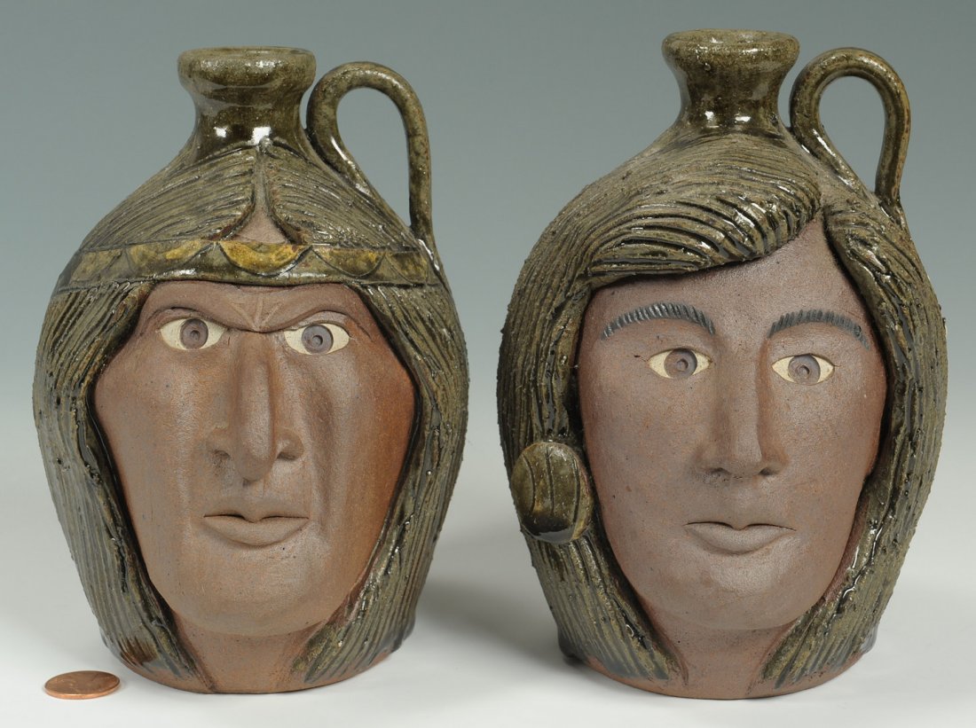 Pr. of Miniature Crocker Indian Face Jugs: Pair of miniature Melvin and Michael Crocker Indian face pottery jugs, a male with headband and a female with earring. Both bases incised Michael A. Crocker and Melvin S. Crocker 1993. Male measures 6