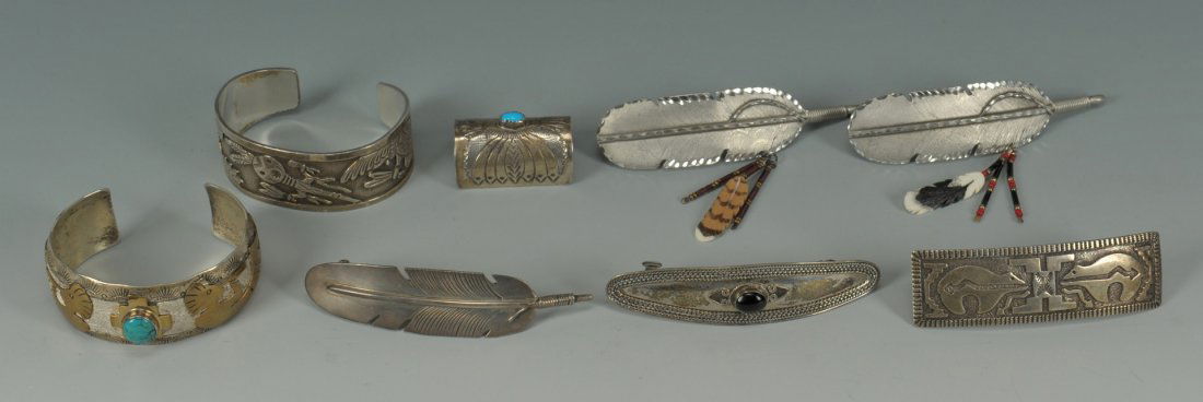 Native American Silver Bracelets & Hair Clips, 8 p: Grouping of Native American silver cuff bracelets and hair clips, including one Zuni design sterling cuff bracelet with 12 K applied gilt decoration and turquoise stone and maker's mark MT; one sterli