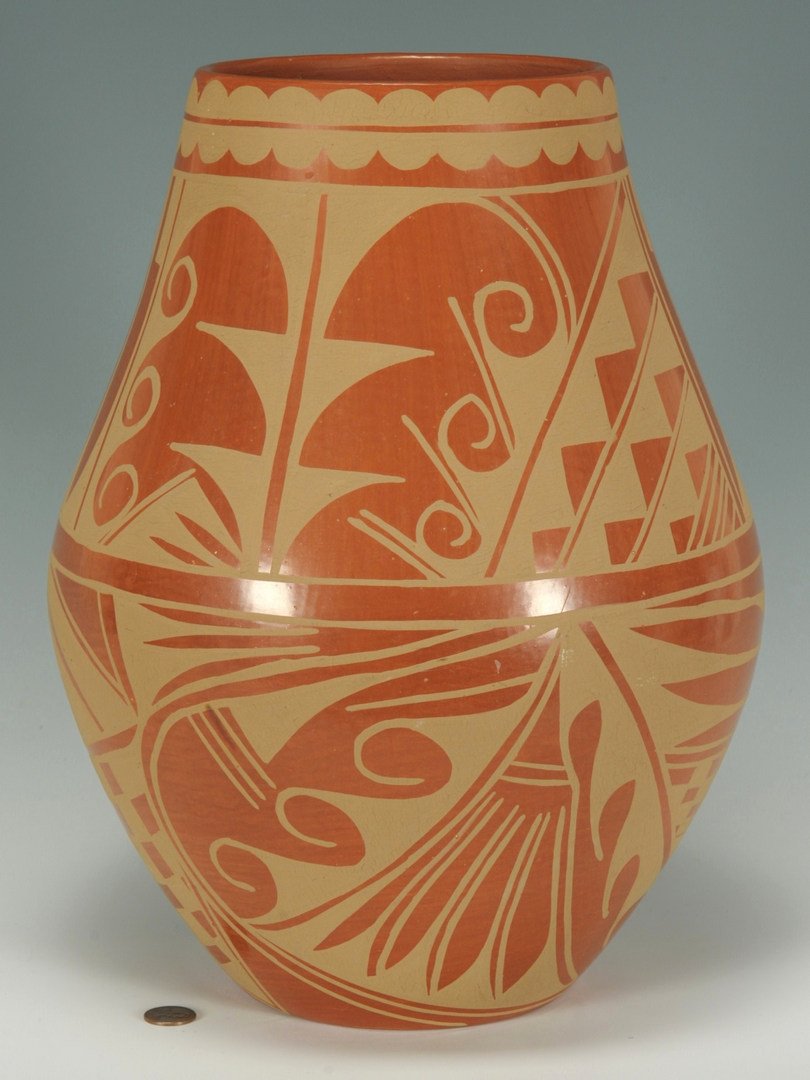 Large San Ildefonso jar, Cynthia Starflower: Large San Ildefonso reddish-brown jar, with feather and geometric designs to body and scallop design to rim, signed on bottom Cynthia Starflower / San Ildefonso / Pueblo, with flower symbol. 13-1/2"H.