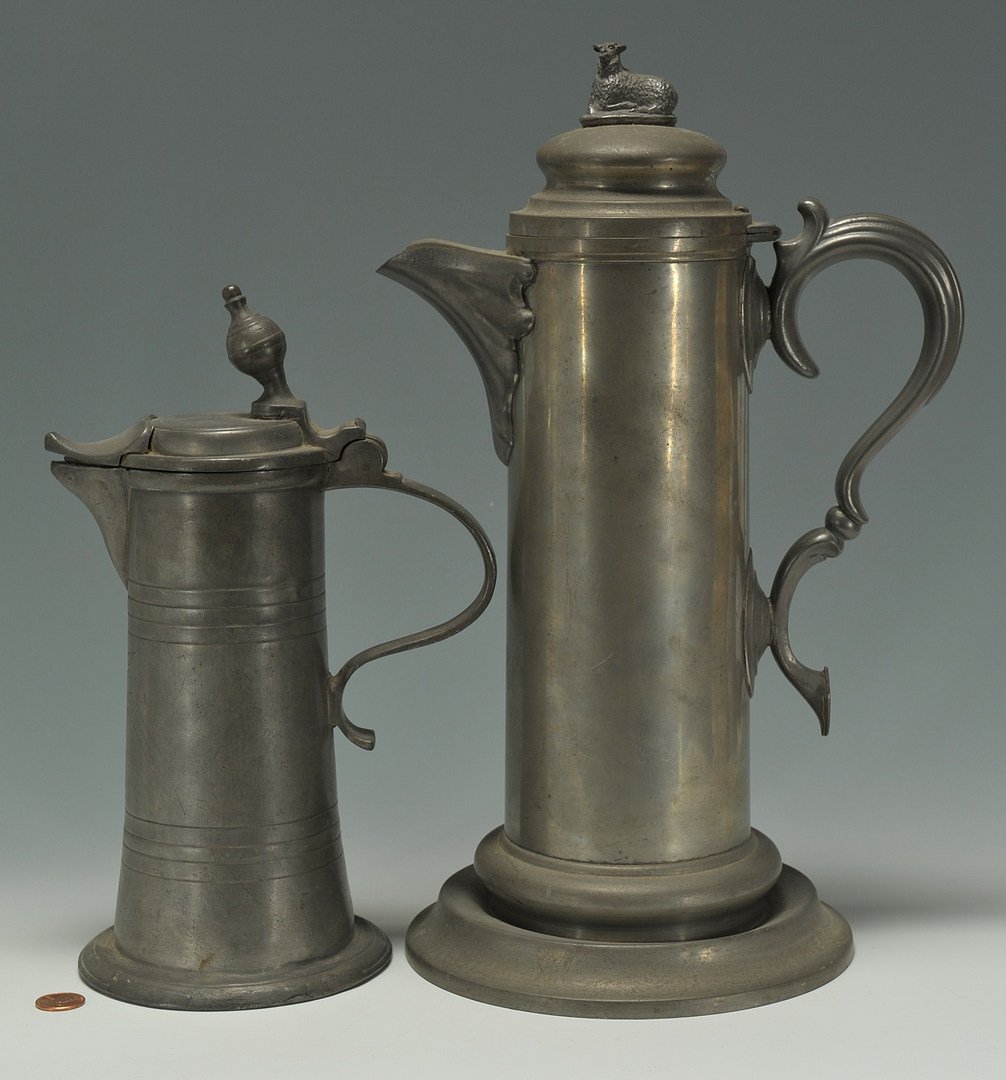 2 Pewter Flagons, incl. Philadelphia: 1st item: Philadelphia pewter flagon with lamb finial, impressed mark on base: E. KAUFMAN PHILA, 15"H. American, mid 19th century. 2nd item: Pewter flagon with ball finial and heart shaped spout, C sc