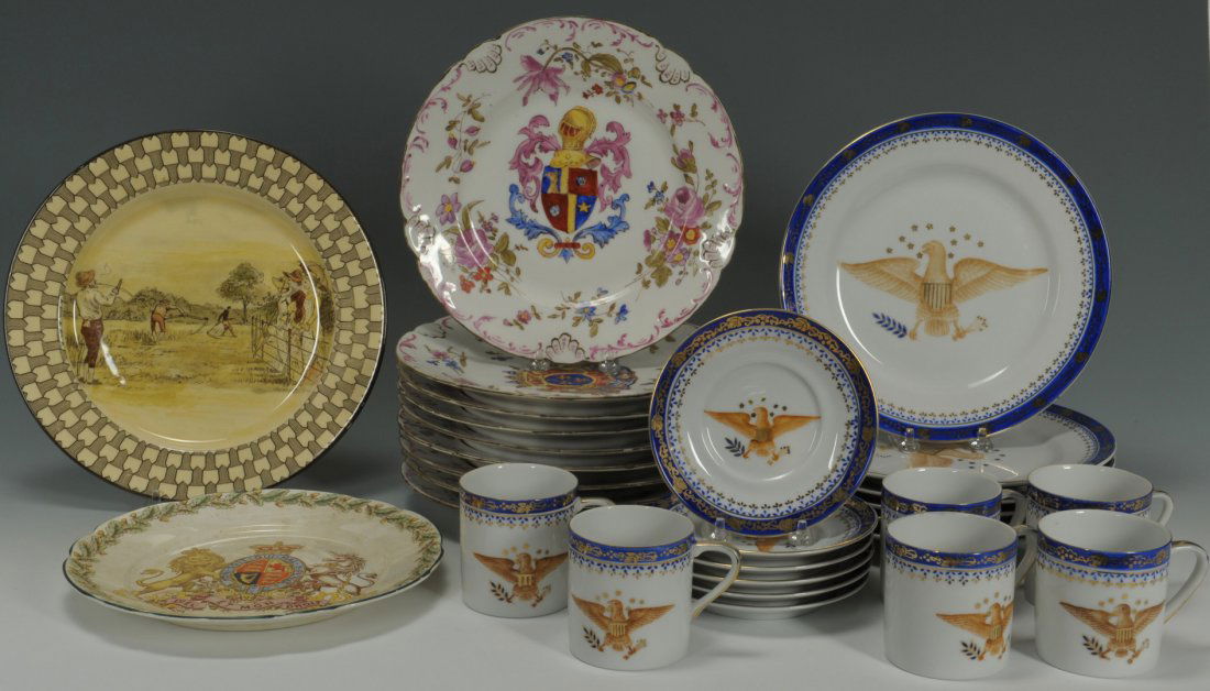 Assembled Grouping of Porcelain, 29 pieces: 1st through 9th item: German armorial plates with hand painted floral spray decorated borders, the centers with assorted coats of arms, marked on back with a blue overglaze crossed swords mark. 9-3/4"