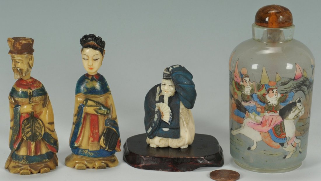 3 Chinese Snuff Bottles & Japanese Netsuke: 1st & 2nd items - A pair of Chinese polychromed ivory figural snuff bottles, the man holding a spear, the woman a scroll, each 3-3/8"H. 3rd item - Large reverse painted snuff bottle with scene depicti
