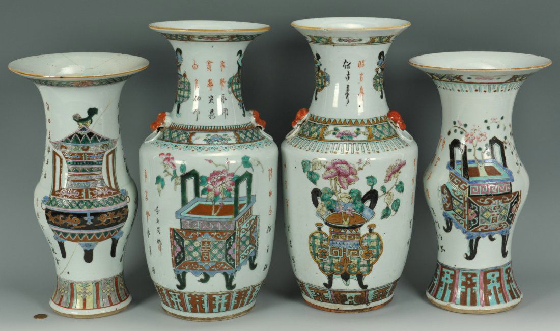 4-piece Chinese porcelain garniture set: 4-piece Chinese porcelain garniture set, each vase with flared rim and rose medallion decoration of vases and flowers with Chinese lettering. 17" - 14-1/2" H.
