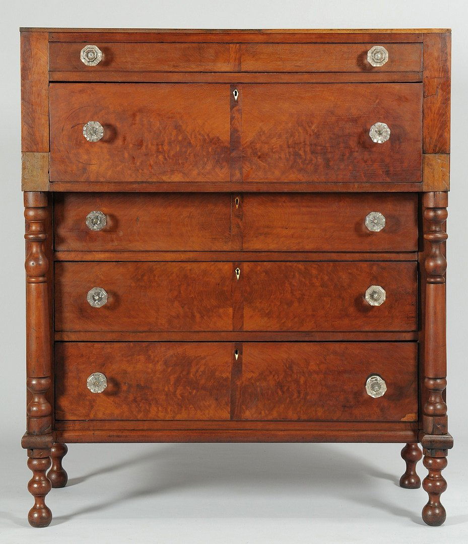 Southern Cherry Chest of drawers, poss. TN: Southern Sheraton chest of drawers, cherry with yellow pine secondary wood, featuring two primary drawers above three graduated drawers flanked by turned columns, and resting on turned feet. All drawe