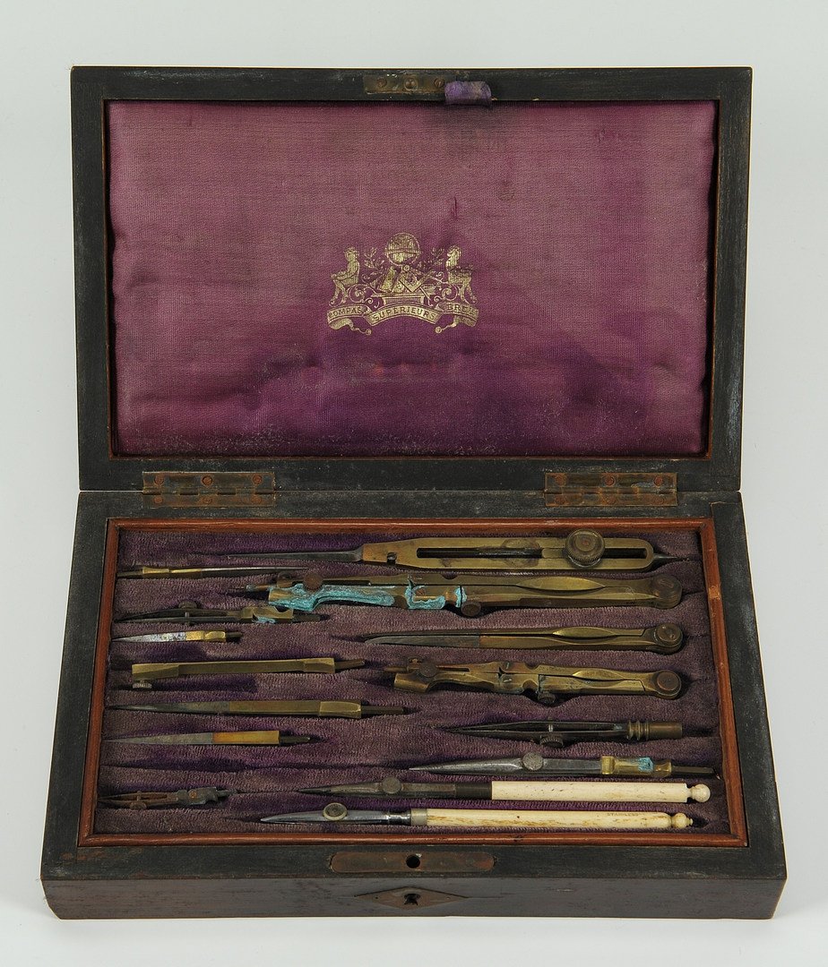Cased set of architect's tools, Compas Superieurs: Cased set of brass and ivory architect drafting instruments, sixteen pieces fitted inside a brass inlaid mahogany box with purple silk and velvet lined interior, with label for Compas Superieures Brev
