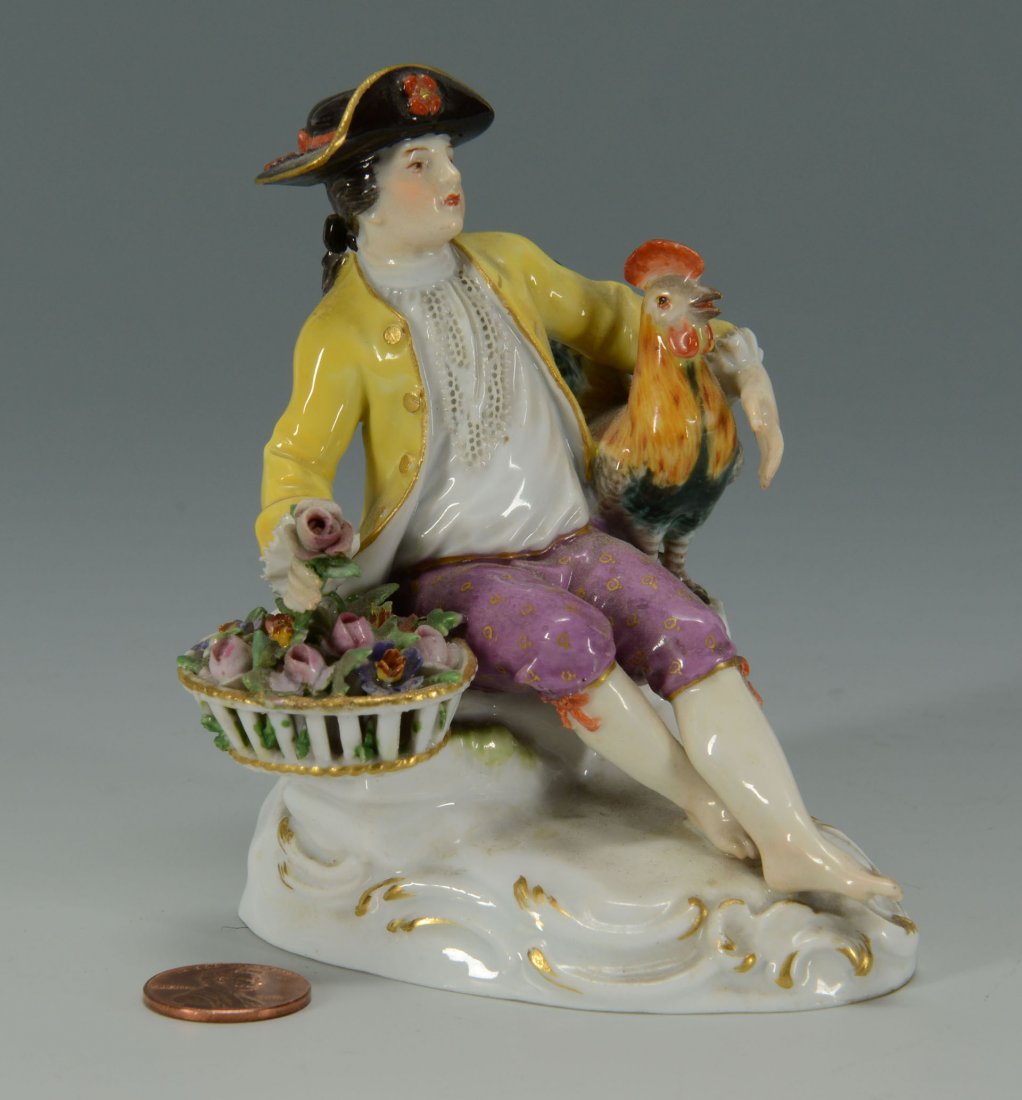 Meissen Porcelain Figure of Man w/ Rooster: Meissen porcelain figure of a seated man posed with a rooster and basket of flowers. Blue crossed swords mark and impressed numbers "122" and "2973" to the base. 19th century. 4&qu