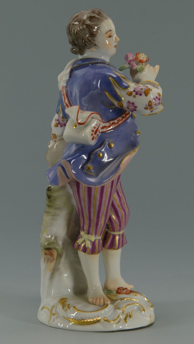 Meissen Porcelain Figure of Man Holding Flower: Meissen porcelain figure of a man holding a flower in one hand and a hat in the other. Base marked with blue crossed sword mark and the numbers "730F" and "79". 5" H. 19th cen
