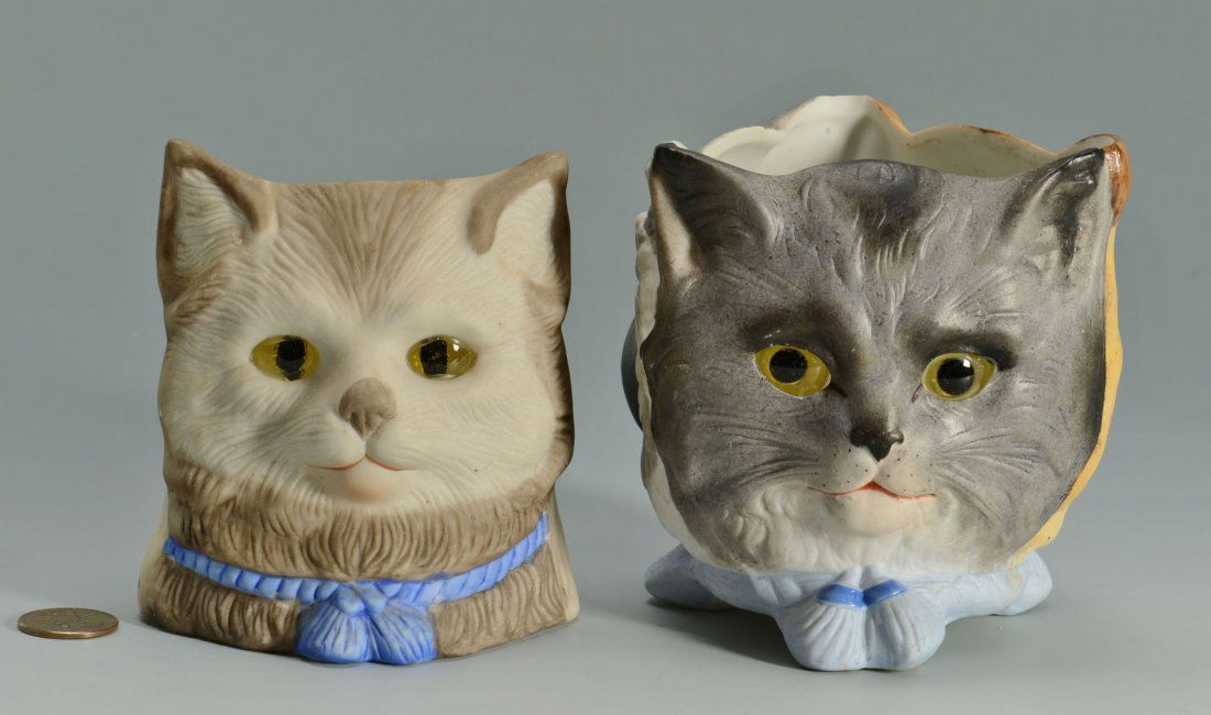 2 Bisque Figural Nursery Fairy Lights: Grouping of two bisque figural nursery fairy lights. 1st item: Bisque figural nursery light, tri-faced with owl, cat and dog, each face having inset glass eyes. Base marked KPM. 4" H. 2nd item: L