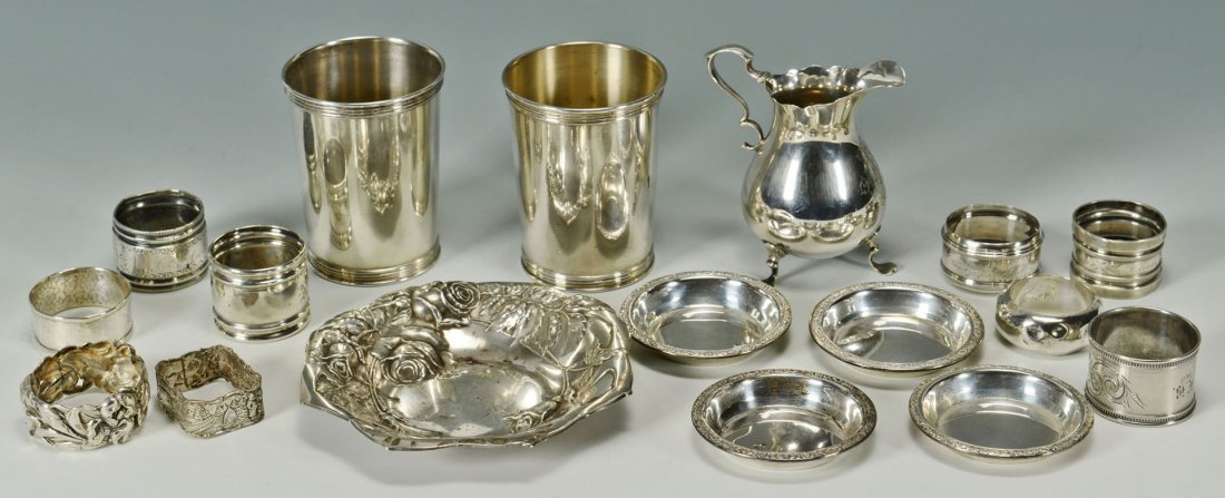 Sterling candy dish, juleps, napkin rings & nut di: 1st item: Sterling silver candy dish by Baird-North Co with repousse rose decoration, 5-1/2" diam. 2nd item: Rococo style sterling silver cream jug by Dominick & Haff for J.E. Caldwell, 4"H.