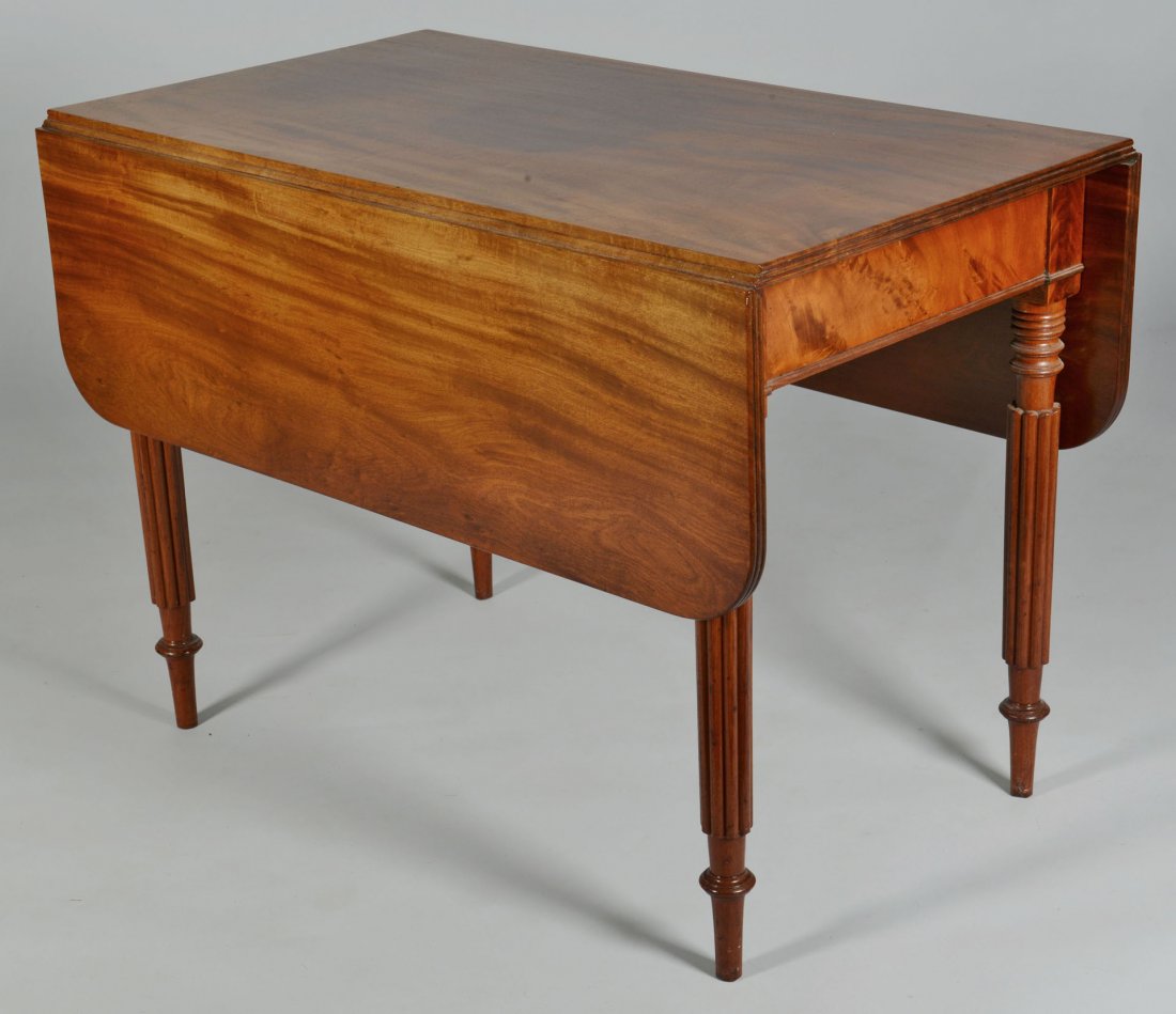 Mid-Atlantic Pembroke Table, poss. Baltimore: Mid-Atlantic Sheraton mahogany Pembroke table, possibly Baltimore. Poplar secondary wood. Rectangular top and rounded leaves with figured wood, resting on turned reeded tapering legs. 28 3/4" H x