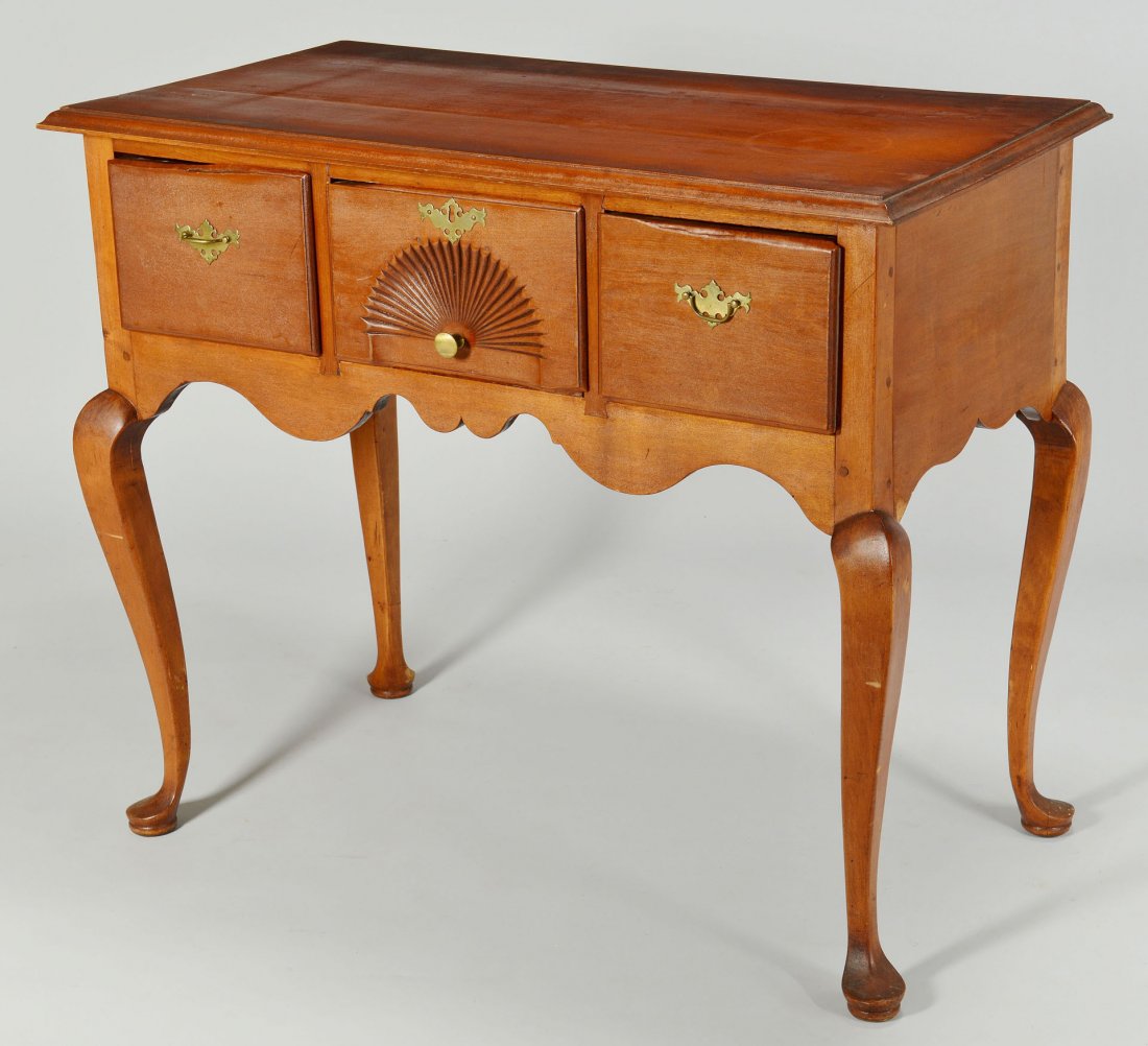 18th century cherry lowboy or dressing table: Cherry lowboy or dressing table with white pine and possibly cedar secondary woods, molded top over a base with scalloped apron and three drawers, all with thumb molded edges and original hardware, th