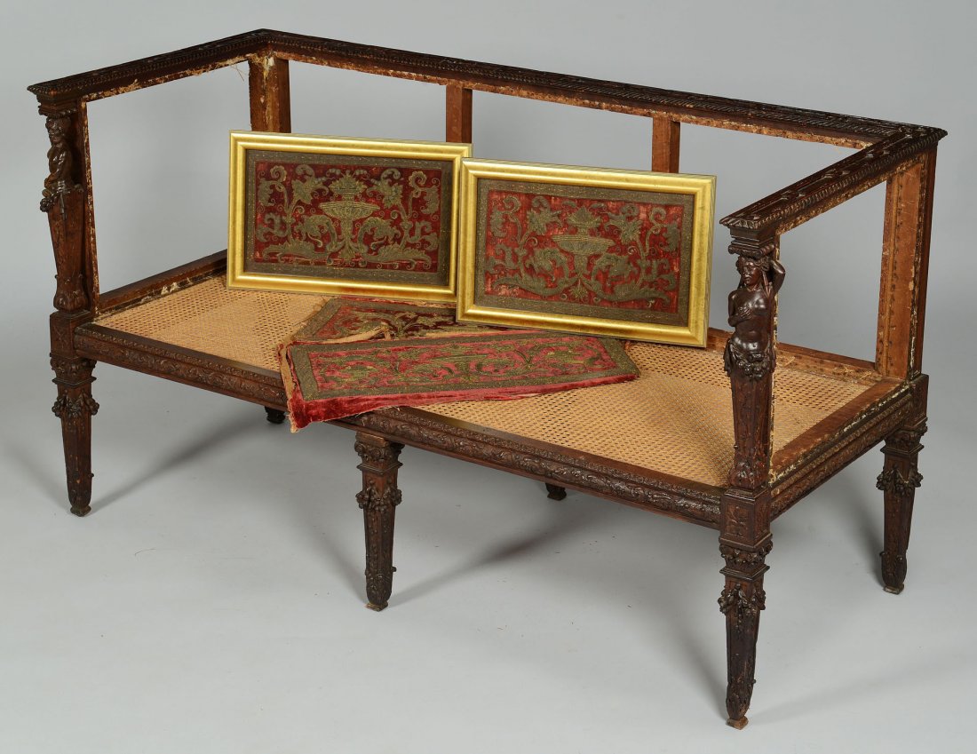 Carved Renaissance Style Settee & 15th C. Fabric: Continental carved Renaissance style settee, horizontal back with carved strapwork ornamentation across the top, and two male and female caryatids adorning the front arm supports. Caned seat. Skirt is