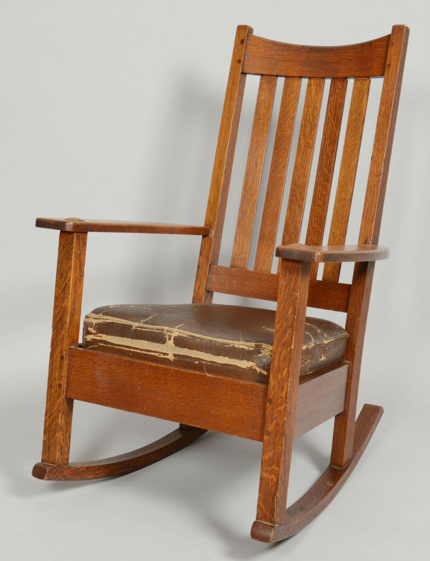 Arts & Crafts Charles Limbert Rocker: Oak Arts & Crafts Charles Limbert Rocker with the impressed Limbert mark underneath the left arm. Retains an old, possibly original finish and the original leather seat. 37 1/2" H x 25" W x