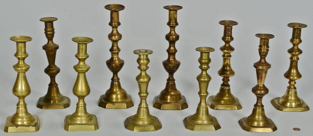 Grouping of 10 Brass Candlesticks, 5 pairs: Grouping of 10 Brass Candlesticks, 5 matching pairs. All with baluster and ring stems, square bases with canted corners. Heights range from 11" to 8". 19th century, most English. Provenance: