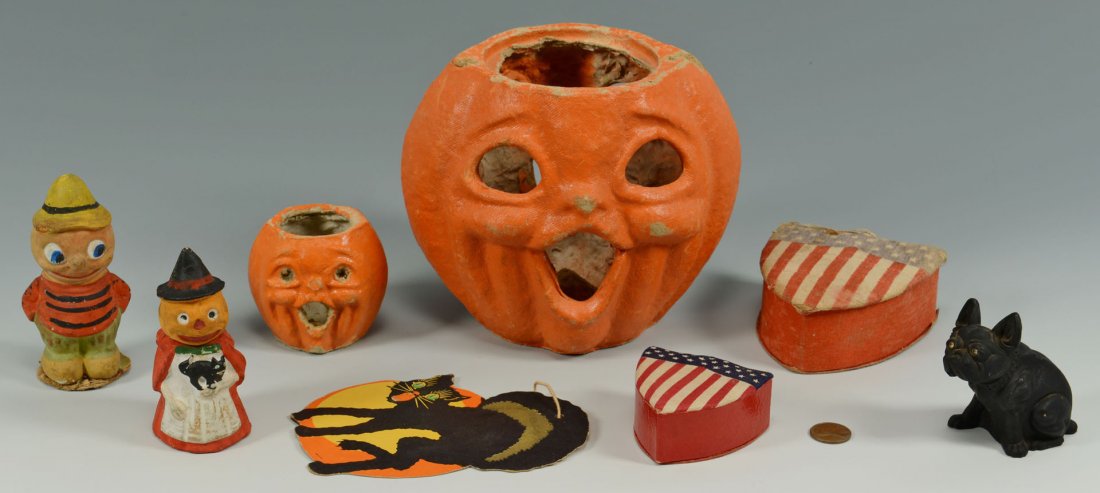 Halloween and Independence Day items: Grouping of 8 early 20th century Holiday items, Halloween and Fourth of July. Includes two paper mache jack o lanterns, one composition candy container modeled as a Jack O'Lantern headed witch holding