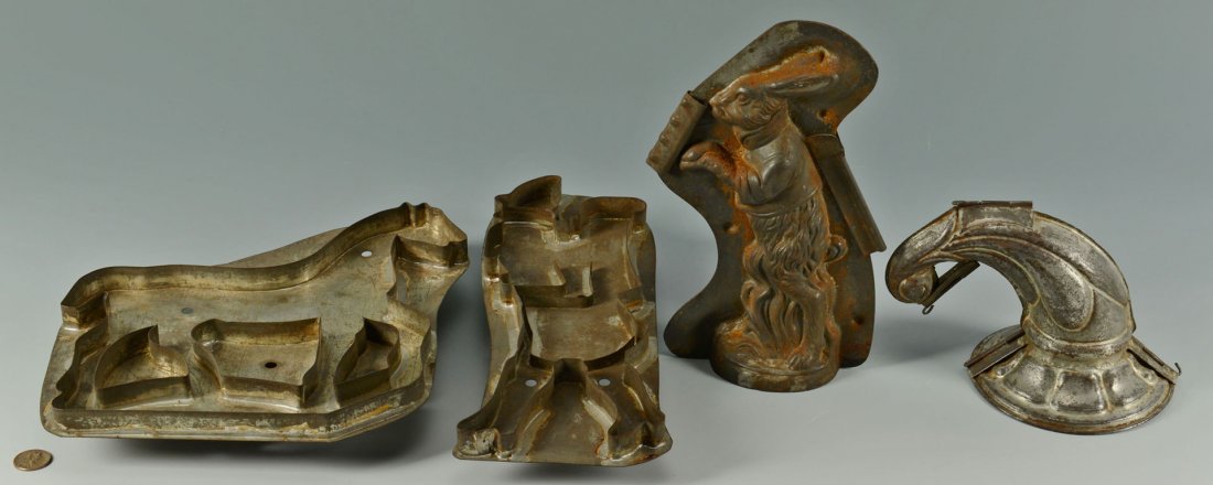 Early Tin Chocolate Molds and Large Cookie Cutters: Early Tin Chocolate Molds and Large Cookie Cutters, 4 pcs. 1st item - Large tin cookie cutter in the shape of a walking horse, mounted on a flat plate with six vent holes and tin handle. 9" X 9&q