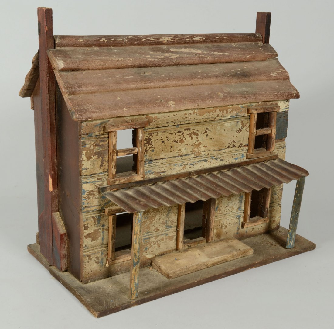 Folk Art Dollhouse Cabin: Folk art doll's house, 2 story cabin with porch and 2 chimneys, constructed of old/reclaimed wood with tin porch roof. 24"H x 25-1/2"W x 16"D. Height of first floor ceiling: 7". 20