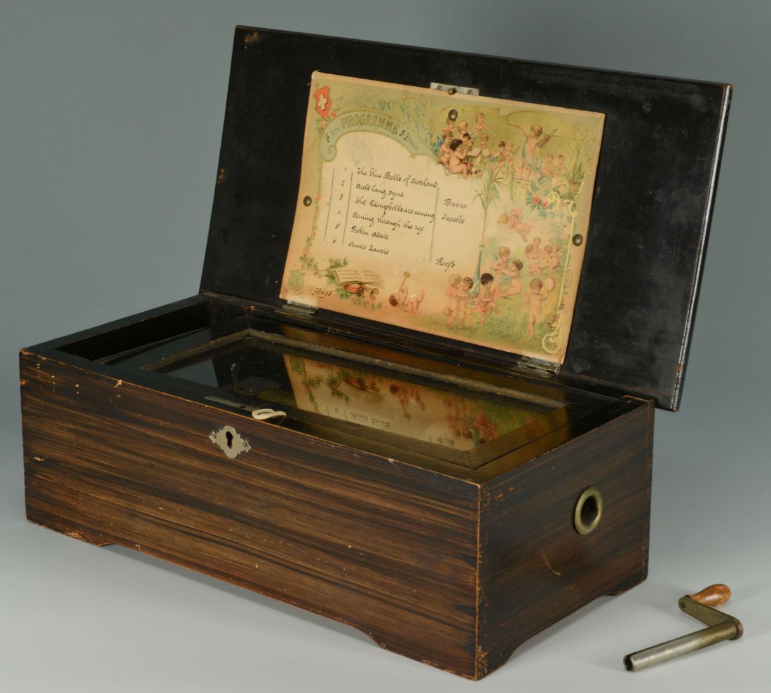 Mermod Freres Cylinder Music Box, 6 tunes: Mermod Freres music box with rectangular grain paint decorated case. 3-1/2" cylinde, crank wind. Plays six Scottish themed tunes, including the Blue Bells of Scotland, Auld Lang Syne, The Campbel