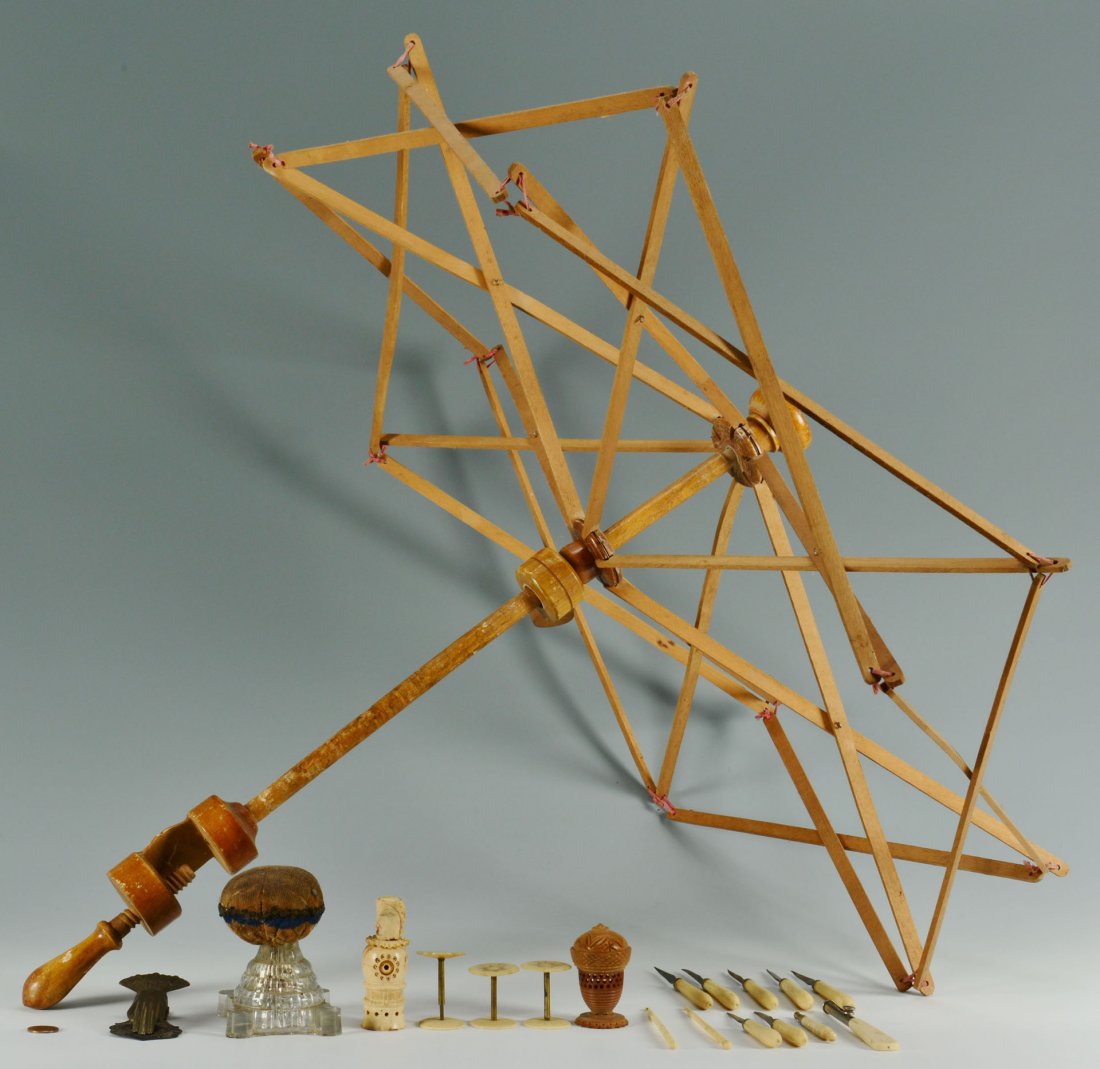 Grouping of Sewing Items includ. yarn winder: Grouping of sewing items and related. Includes a large wooden maple yarn winder, 3 spool holders with mother of pearl and bone ends, a vegetable ivory needle case holder, figure sewing implement of bo
