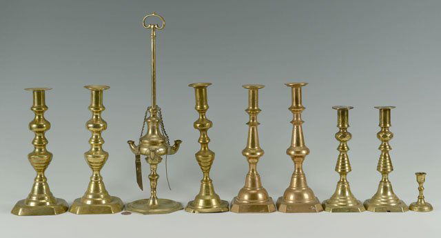 Grouping of Brass Candlesticks, 19th c.: Group of brass candlesticks including 1 Lucerne lamp (15-3/4" H); 3 Pair including 1 beehive shape (8-9-1/2" H); 1 Single miniature style (2-3/4"), early to mid 19th century. 8 items to