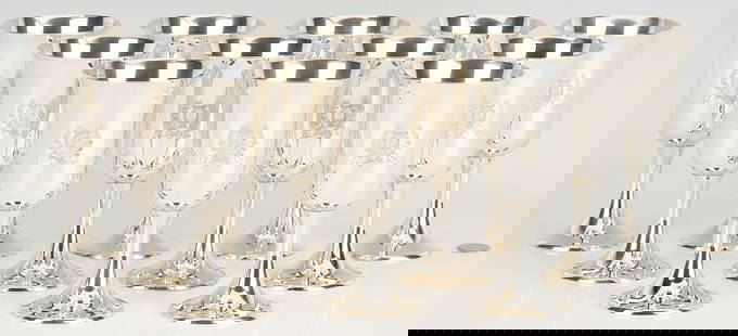 Set of 12 Gorham Sterling Silver Goblets: Twelve (12) Gorham goblets, each engraved with a Neoclassical style harp, wreath, and bow design. Not monogrammed. Signed on the underside: Gorham / 272. 6 5/8 in. H. 69.36 total troy