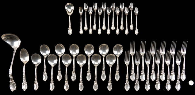 40 Pcs. Reed & Barton Sterling Flatware, La Parisienne: Partial service of Reed & Barton sterling silver flatware in the La Parisienne pattern (introduced 1902, discontinued). Pieces include: twelve (12) round bowl gumbo spoons (7 1/4 in. L), twelve (12) d