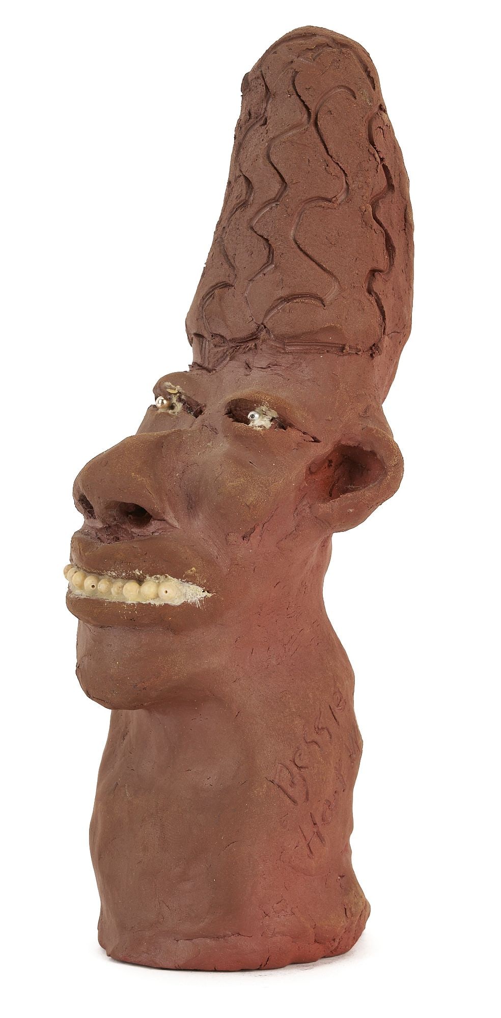Bessie Harvey Folk Art Sculpture, Exhibited: Bessie Harvey (Alcoa, TN, 1929-1994) untitled folk art sculpture, fired clay, depicting a female bust with high tapering hair and incised swirls, silver bead eyes, and white beads for t