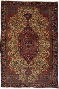 Antique Farahan Sarouk Carpet, 8 ft. x 12 ft.: Antique Persian Farahan Sarouk carpet, wool on cotton foundation. Dark red-shaped center medallion on a shaped ivory field with red ground spandrels. Scrolling foliate and medallion designs