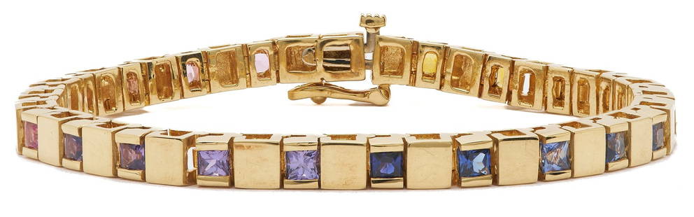 18K Gold and Gemstone Tennis Bracelet: Ladies 18K yellow gold tennis bracelet featuring seventeen (17) synthetic spinals in a rainbow. The bracelet is marked "18K" and XRF tests 18K gold. The bracelet is 7" L. and has a gross weight of 28.