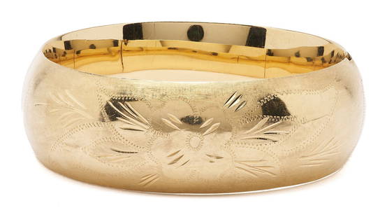 14K Gold Wide Band Bangle Bracelet: Ladies 14K yellow gold wide band bangle bracelet. The bracelet is marked "RB 14K" and XRF tests 14K gold. The bracelet is 7 in. L. and has a weight of 35.87 grams. Additional high-resolution photos ar