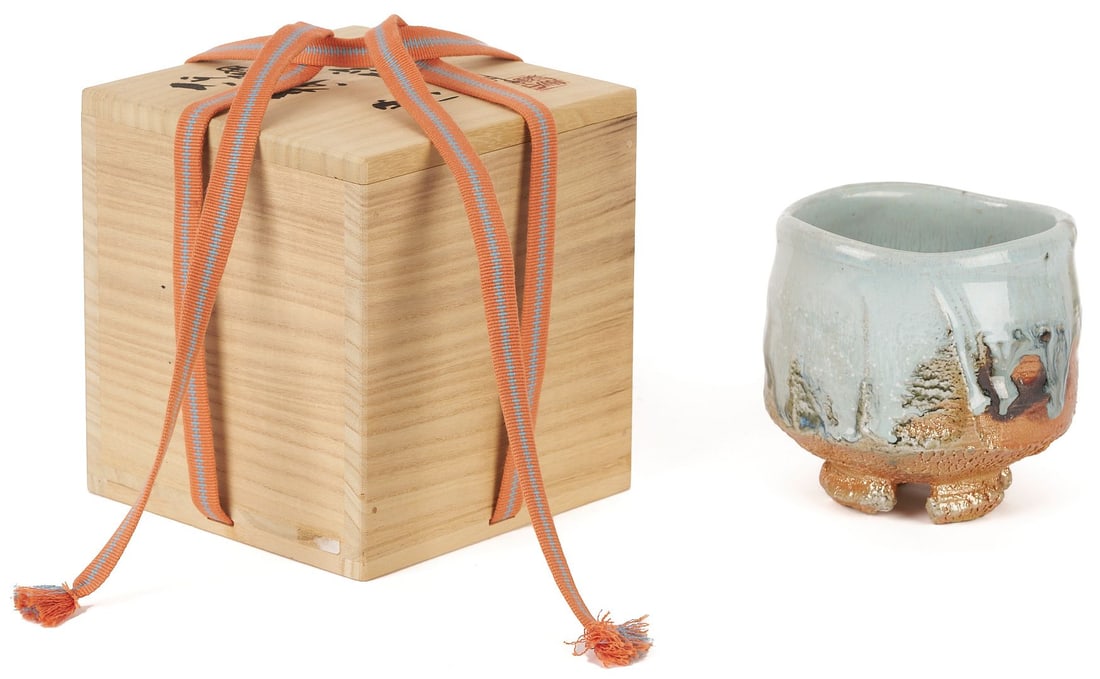 Tadashi Nishihata Ceramic Tea Bowl: Tadashi Nishihata (Japanese, b. 1948) ceramic tea bowl, round form raised on four feet with Haiyu glaze. Housed in the original box with inscription and artist's seal on the lid. The bowl also retains