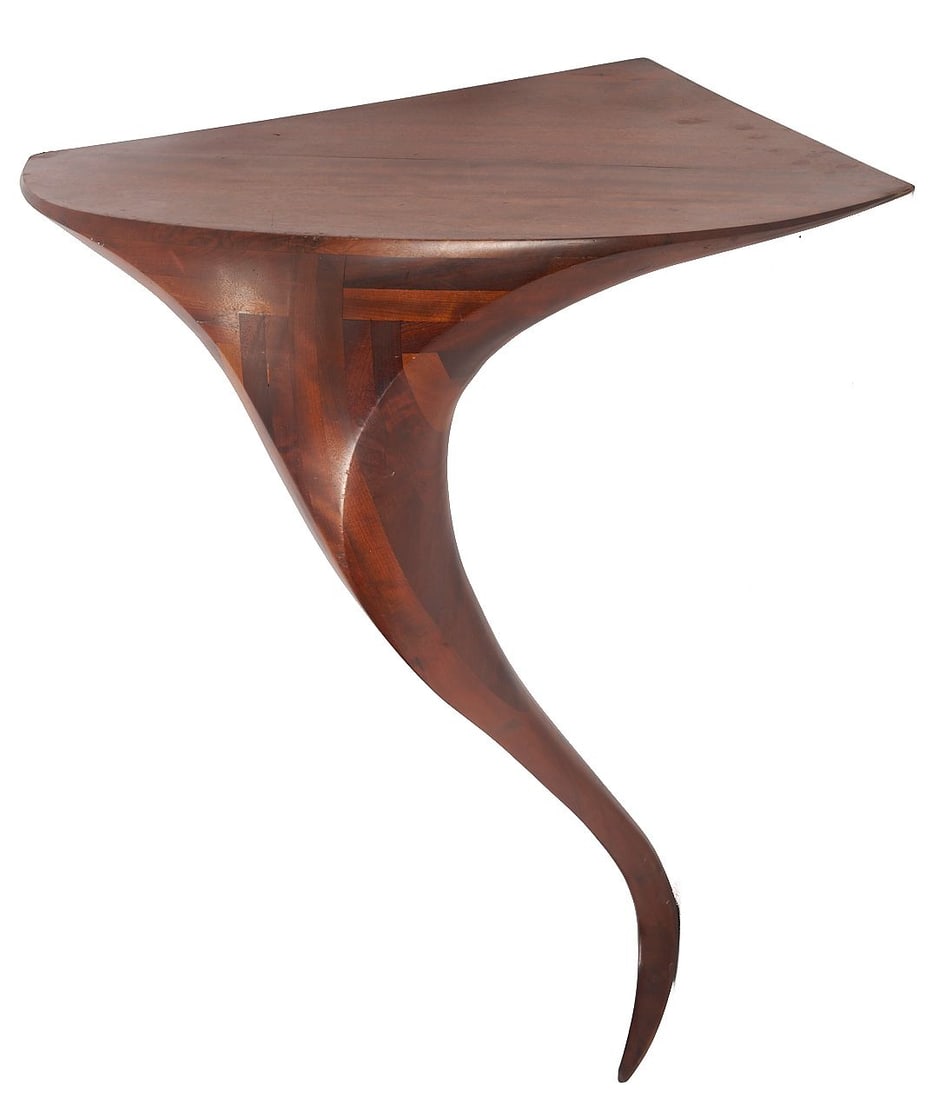 Modern Signed Victor DiNovi Table: Victor DiNovi wall mount corner table, constructed of laminated and carved rosewood and incised on the top underside "Victor DiNovi/Santa Barbara/1996". 29 3/4 in. H x 26 in. W x 23 in. D. Additional