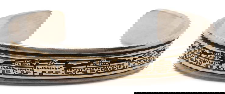 Sterling Silver & 14K Gold Navajo Bracelet: Ladies sterling silver and 14K yellow gold cuff bracelet by Navajo artist MM Rogers. The bracelet is marked "M.M. Rogers 925 14K" and XRF tests sterling silver with 14K accents. The bracelet is 6 1/2